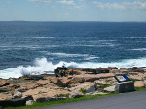 Down close to the edge watching the waves crash